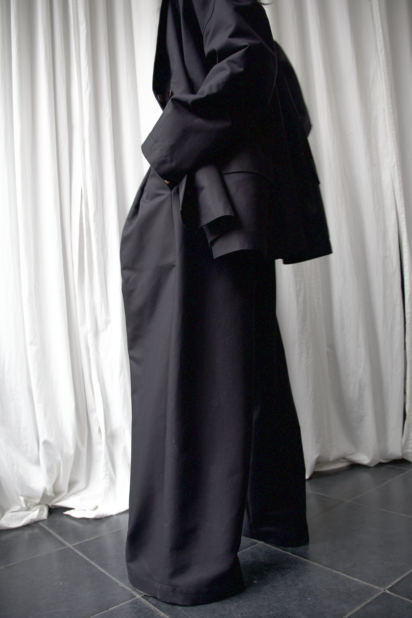 ARCHETYPE Billowing trousers in black heavy twill