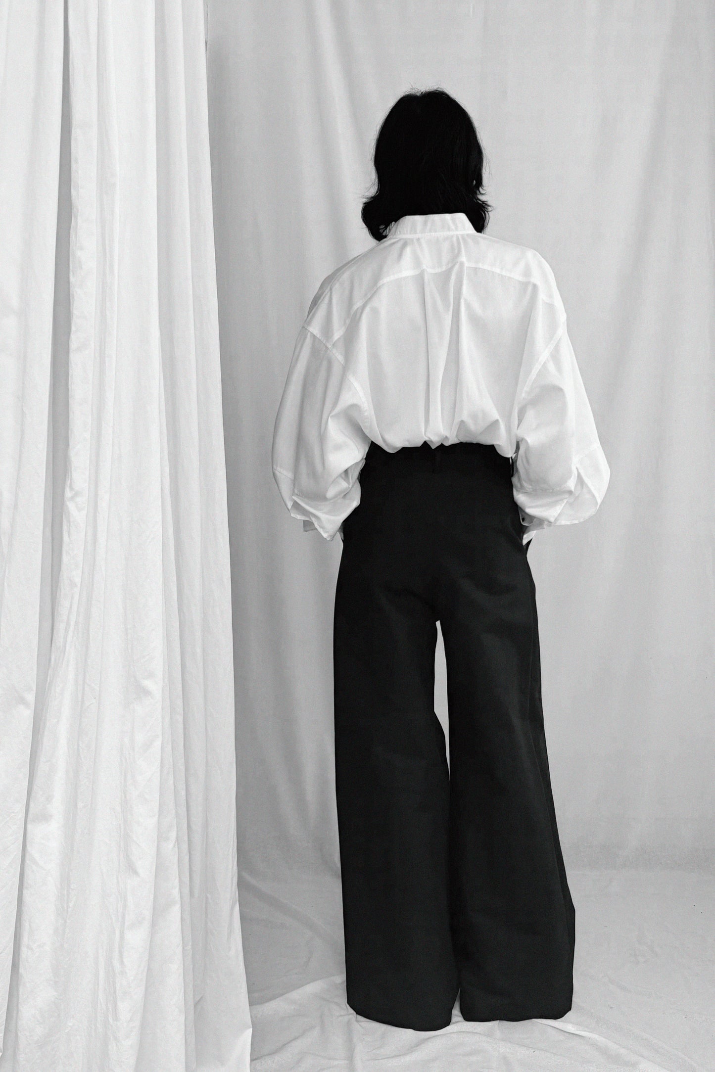 ARCHETYPE WIDE PLEATED COTTON TROUSERS