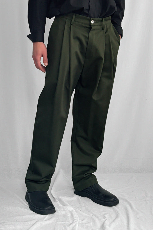 ARCHETYPE NARROW PLEATED COTTON TROUSERS