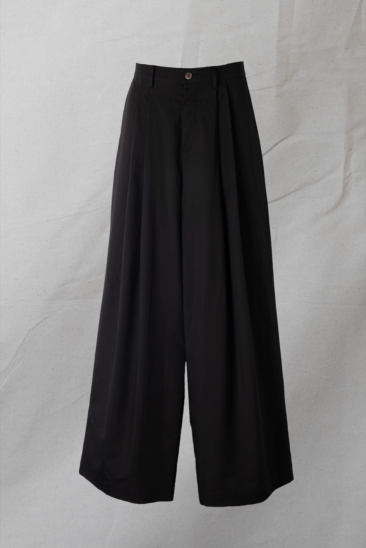 ARCHETYPE WIDE PLEATED COTTON TROUSERS